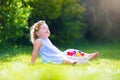 Little girl on Easter egg hunt Royalty Free Stock Photo