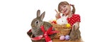 Little girl with easter rabbits