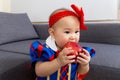 Little girl eat apple Royalty Free Stock Photo