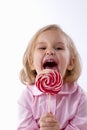Little girl eat big lollopop Royalty Free Stock Photo