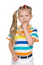 Little girl eating a bagels Royalty Free Stock Photo