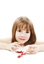 Little girl eating a boiled easter egg
