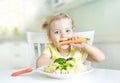 Little girl eating carrot,vegetables,healthy food.Child`s nutrition Royalty Free Stock Photo