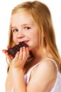 Little girl eating chocolate Royalty Free Stock Photo