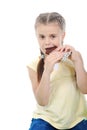 Little girl eating chocolate. Royalty Free Stock Photo