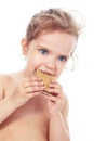 Little girl eating a cookie Royalty Free Stock Photo