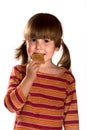 Little girl eating cookie Royalty Free Stock Photo