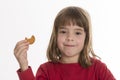 Little girl eating a cookie Royalty Free Stock Photo