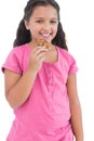 Little girl eating a cookie Royalty Free Stock Photo