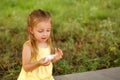 Little girl eating cotton candy. Royalty Free Stock Photo