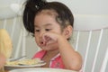 Little girl is eating delicious food Royalty Free Stock Photo