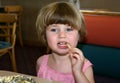 Little girl eating french fry Royalty Free Stock Photo