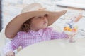 Little girl eating fruit salad. Royalty Free Stock Photo