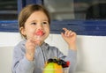 Little girl eating healthy snack Royalty Free Stock Photo