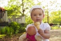 Little Girl Eating Ice-cream Outdoor