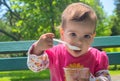 Little Girl Eating Ice cream Outdoor