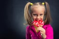 Little girl eating lollipop Royalty Free Stock Photo