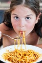 Little girl eating pasta Royalty Free Stock Photo