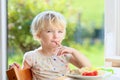 Little girl eating pasta for lunch