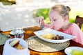 Little girl eating pasta Royalty Free Stock Photo