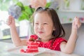 Little girl eating strawberry cake Royalty Free Stock Photo