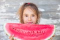 Little girl eating tasty watermelon Royalty Free Stock Photo