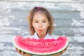 Little girl eating tasty watermelon Royalty Free Stock Photo