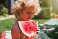 Little girl eating watermelon Royalty Free Stock Photo