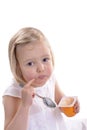 Little girl eating youghurt