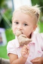 little girl eats cake Royalty Free Stock Photo