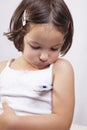 Little girl with electronic thermometer Royalty Free Stock Photo