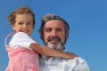 Little girl embracing grandfather Royalty Free Stock Photo