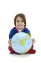 Little girl embracing the world globe Royalty Free Stock Photo