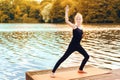 Little girl is engaged in martial arts at sunset Royalty Free Stock Photo