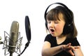 Little girl engrossed in singing