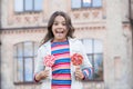 Little girl enjoy summer vacation eat sweets, caramel lollipop concept