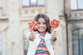 Little girl enjoy summer vacation eat sweets, generous kid concept
