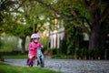 Little girl enjoying bike ride on warm summer day Royalty Free Stock Photo