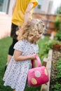 Little girl enjoying Easter Egg Hunt Royalty Free Stock Photo