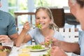 Little girl enjoying lunch Royalty Free Stock Photo