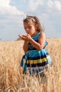 Little girl examines something