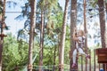 Little girl in an extreme rope park. Royalty Free Stock Photo