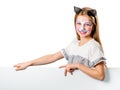 Little girl with face art holding a sheet for your adverisement or text isolated Royalty Free Stock Photo
