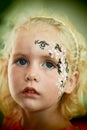 Little girl face painting Royalty Free Stock Photo