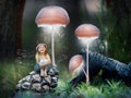 Little girl fairy in a magical fairy forest.