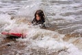 Little Girl Falls Off Boogie Board Shallow Water Breaking Wave Royalty Free Stock Photo