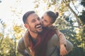 Little girl with father have fun. Love and kisses to Daddy. Royalty Free Stock Photo