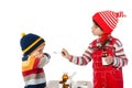 Little girl feeds the medicine by teaspoon to a little boy Royalty Free Stock Photo