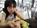Little Girl Feels Lack of appetite with Food