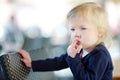 Little girl with finger in her mouth Royalty Free Stock Photo